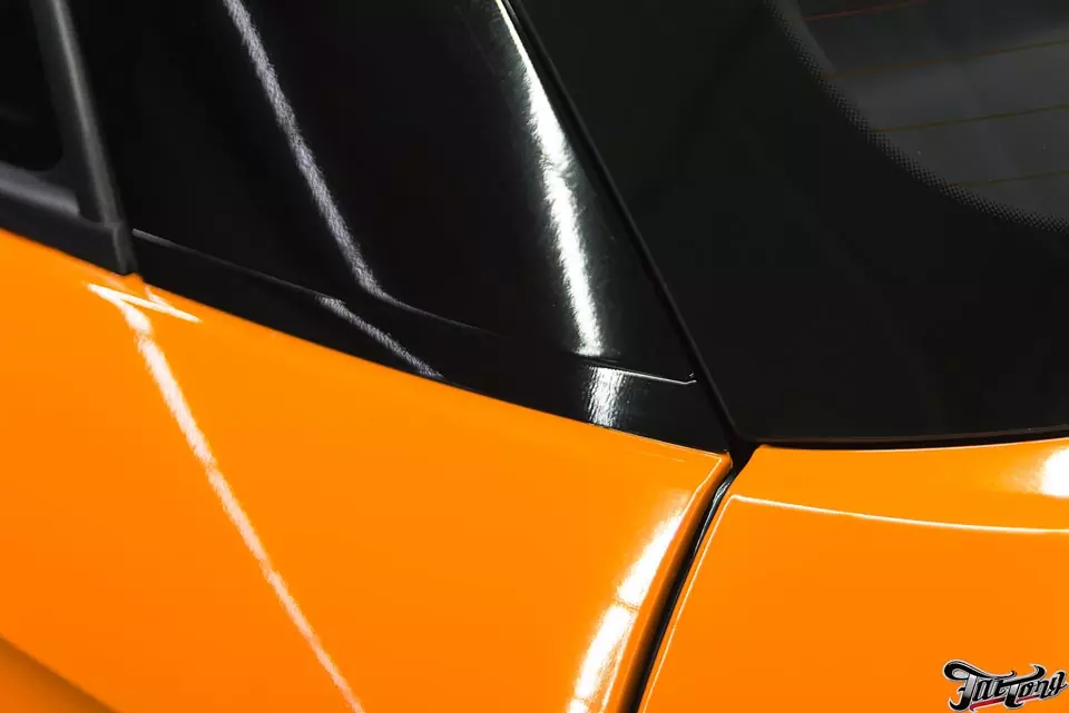 Audi A1. Оклейка кузова в оранжевый и черный глянец.